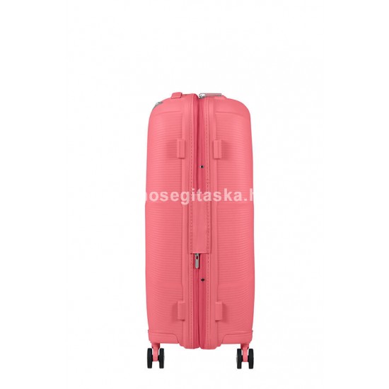 American Tourister STARVIBE négykerekű coral színű, közepes bővíthető bőrönd 146371-A039